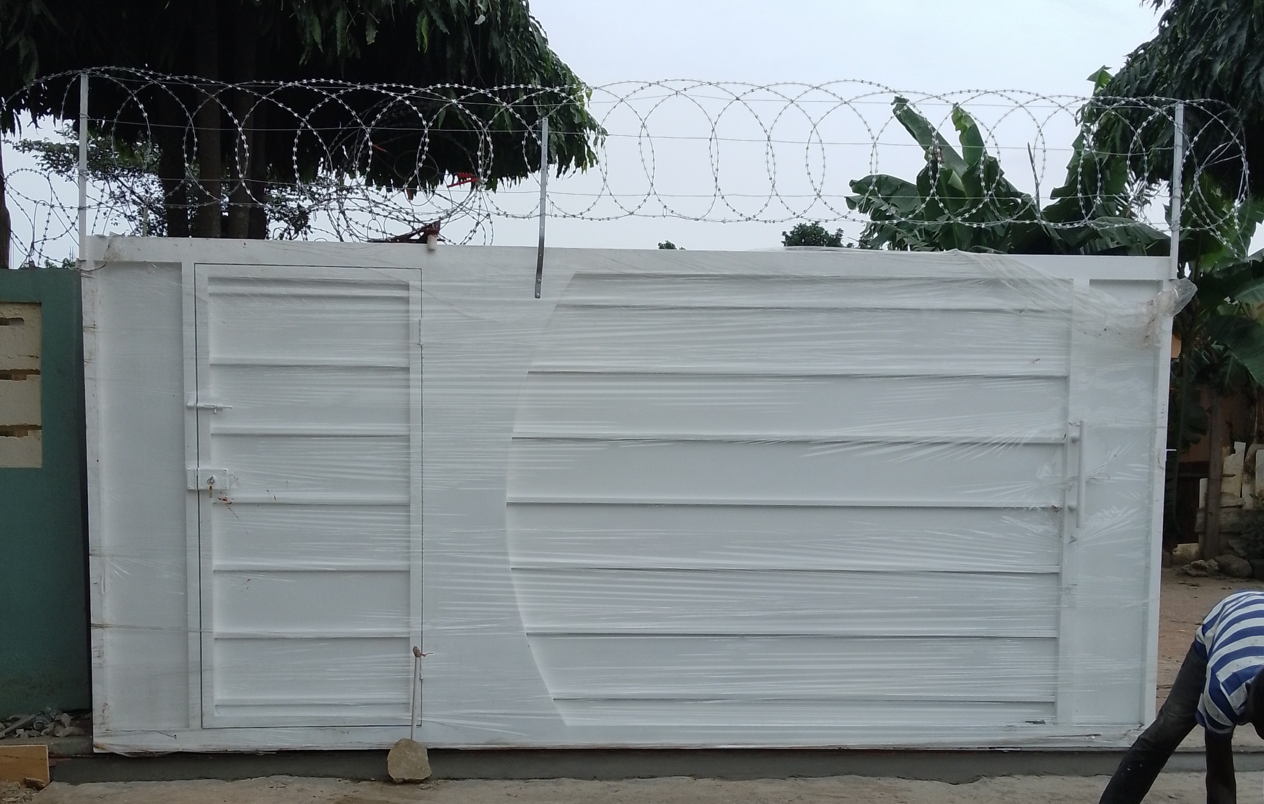 SECURITY ENGINEERING SOLUTIONS automatic gate with razor wire on top
